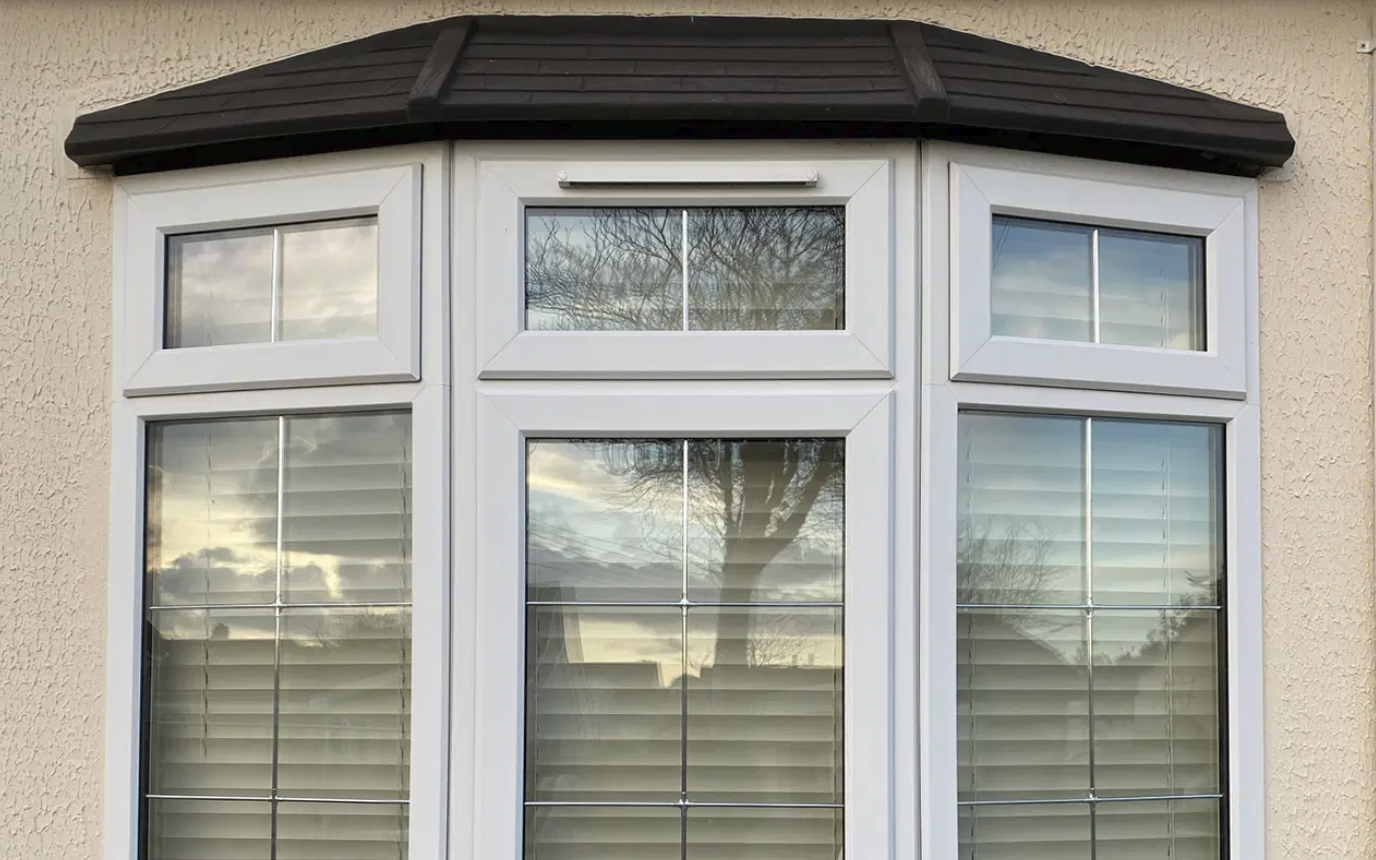 White three-section bay window fitted by ACE GROUP