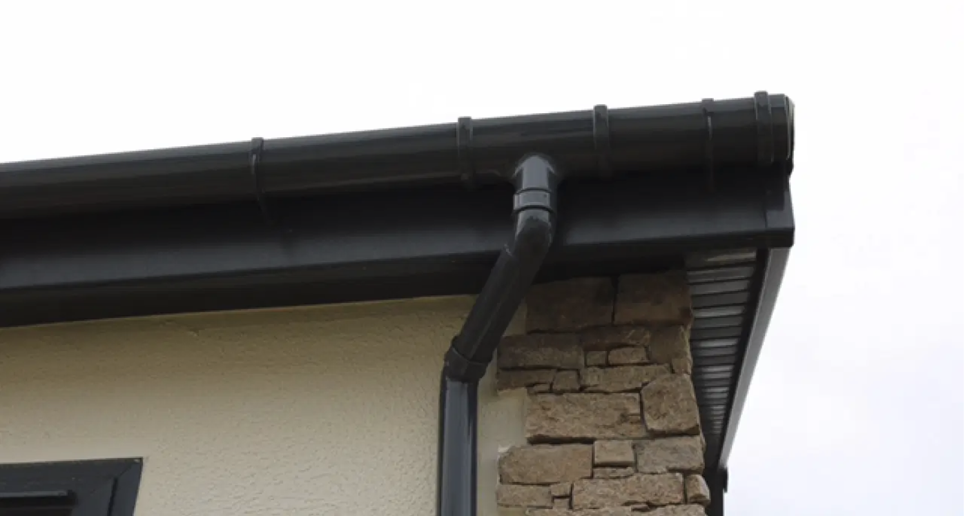 New black fascias, soffits and guttering fitted by ACE GROUP